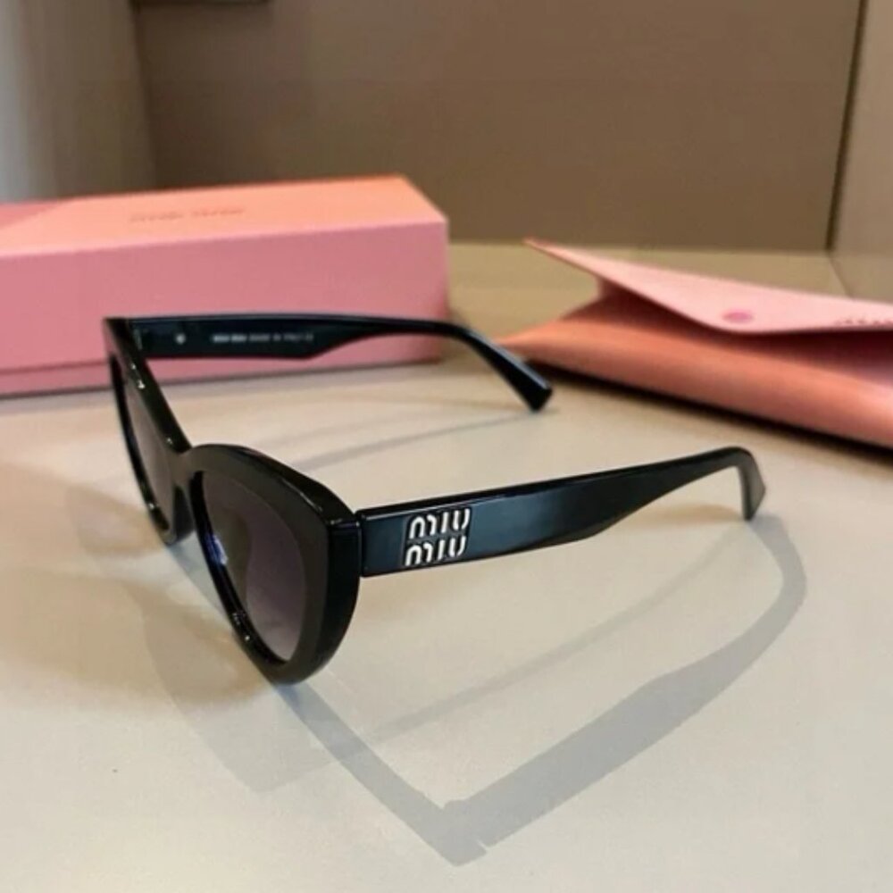 Miu Miu Sleek Black Sunglasses